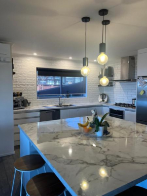 Beach house with a pool, Waihi Beach
